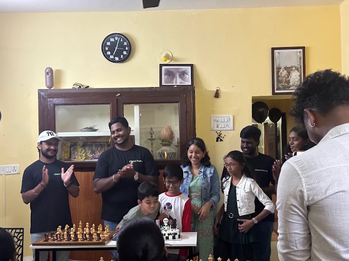 Students, families and coaches gathered at a Chess Panda centre
